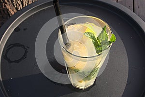Lemonade with ice and fresh mint. photo